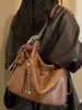 Bolso Retro de Gran Capacidad Transfronterizo para Mujer Otoño 2026 Nuevo Elegante Mochila de Viaje Diario Bolso Tote