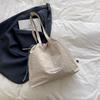 Bolso de lona sencillo e informal para mujer, bolso de mano de estilo coreano de gran capacidad, bolso de hombro moderno y a la moda para primavera y verano 2025.