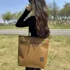 Bolsas de tela no tejida personalizadas, ecológicas, para tiendas de ropa de mujer y niño, regalos de compras, publicidad, bolsas para empaque de textiles para el hogar