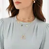 Collar de metal dulce y moderno con cadena de clavícula con borlas de media luna y estrella estilo punk de estilo europeo y americano para mujer