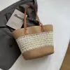 Elegante bolso de paja de gran capacidad, nuevo bolso tejido de verano 2026, bolso de hombro y para el antebrazo, moderno bolso de mujer a rayas