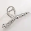 Europeo y Americano Calavera Garra Metal Araña Pinza de Tiburón Grande Accesorios para el Cabello Estilo Oscuro Pinzas para el Cabello Pinza