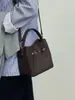 Bolso Cubo Texturizado Estilo Coreano Principios de Otoño para Mujer 2025 Nuevo Popular Bolso de Mano Elegante Estilo Extranjero Versátil para Viajar y Uso Diario Bolso Cruzado