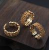 Europa y Estados Unidos estilo frío retención de color oro patrón simple anillo hueco accesorios de joyería antigua anillo retro