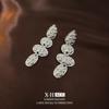 Europa y Estados Unidos viento frío raya geométrica redonda metal pendientes moda mujer simple temperamento pendientes fabricantes pendientes al por mayor