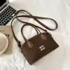 Bolso tote de mano de moda transfronterizo 2026, bolso de hombro de moda vintage, bolso de axila de nicho de alta gama