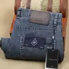 Moda de Lujo Primavera y Verano Azul Gris Poliéster Delgado Elástico Recto Ligeramente Sueltos Jeans para Hombre