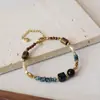 Collar Maillard de Obsidiana Natural y Ojo de Tigre para Mujer Otoño e Invierno Nuevo Retro Lujo Accesible Acero de Titanio Moda Joyería Versátil