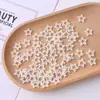 Parche de ABS blanco arroz perla imitación lazo hueco luna estrella círculo amor mariposa accesorios hechos a mano DIY