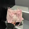 Moda de Verão Transfronteiriça 2025 Novo Estilo Lindo Laço Grande Capacidade Bolsa de Mão Feminina Bolsa Tote Bolsa de Ombro para Sob o Braço