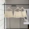 Saia Média Jacquard com Franjas Cor Branco Creme Saia Média Curta Bodycon com Babados de Chiffon