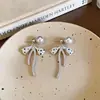 Pendientes de Botón de Perla con Lazo de Circonita Cúbica Plata Aguja Frescos Dulces Moda Exquisitos Pendientes Nicho de Gama Alta Versátiles