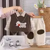 Conjunto de Ropa de Primavera para Niños 2026 Nuevo Elegante Moda Infantil Suéter Chaleco de Dibujos Animados Conjunto de Tres Piezas para Primavera y Otoño