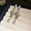 Pendientes de Plata Estilo Vintage con Colgantes de Lágrima Tachonados de Diamantes, Lujo Ligero y Sensación de Alta Gama, Exquisito Diseño de Clavo, Joyería para Orejas de Nicho