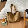 Bolsa de Lona Estética de Alto Valor para Mulheres, Grande Capacidade, Bolsa de Ombro para Estudantes, Bolsa de Mão Portátil, Novo Estilo Tendência Primavera/Verão 2026