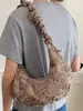 Bolsa de Bolinho Estampa de Leopardo Moda Retrô Outono 2026 Nova Bolsa Leve de Axila Sensação Preguiçosa Relaxada Bolsa de Ombro Único Transversal