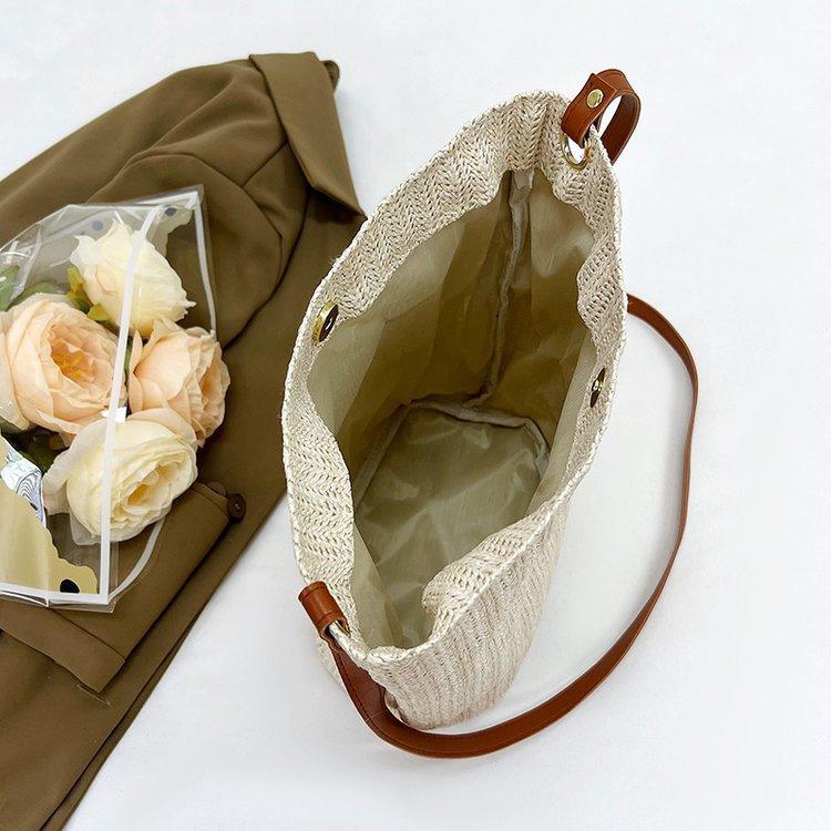 编织包女包新款潮2024夏草编简约百搭小清新水桶包个性单肩斜