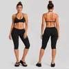 Conjunto de yoga transfronterizo con color contrastante, hermoso top deportivo de cuello halter en la espalda, conjunto de pantalones de yoga y fitness Pilates de secado rápido de cintura baja