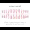 Venta Caliente Transfronteriza Uñas Postizas Hechas a Mano Estilo Dulce y Femenino Forma de Almendra Desgastables Uñas Postizas Falsas de Resina 3D Perla Mariposa