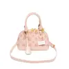 Bolso de Mano Vintage con Forma de Concha 2026 Primavera/Verano Nuevo Bolso Cruzado con Letras en Relieve Bolso de Hombro Elegante de Nicho para Mujer