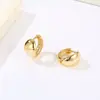 Anillo de cobre chapado en oro de 18 quilates transfronterizo europeo y americano, hebilla de oreja, diseño de círculo de nicho personalizado, pendientes de aro, venta al por mayor de fábrica
