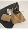 Bolsa Grande Versátil de Camurça e Pelúcia Moda Feminina 2026 Nova Bolsa de Ombro Casual Retrô Bolsa Tote para o Dia a Dia