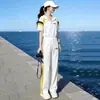 Conjunto Casual da Moda Feminino 2026 Verão Novo Solto Redutor de Idade Estiloso Roupa Esportiva Calças de Pernas Largas Conjunto de Duas Peças