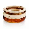 Suministro exclusivo transfronterizo de pulseras redondas de resina de moda, tendencia y nicho, venta al por mayor de joyería vintage redonda de resina degradada