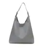 Bolso tejido en relieve vintage de alta gama transfronterizo para mujer, nuevo modelo 2026, bolso tote de gran capacidad para el hombro