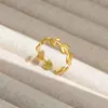 Anillo de acero de titanio ajustable con explosiones transfronterizas al por mayor anillo retro de acero inoxidable con presión de aceite apertura anillo de pareja para hombres y mujeres