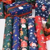 Papel de regalo de Navidad en stock al por mayor transfronterizo superventas nuevo regalo regalo ramo embalaje fabricantes de papel kraft
