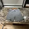Verano Nuevo Hombres Deportes al Aire Libre Casual Versátil Alta Elasticidad Pierna Recta Pantalones Cortos Modernos 12798