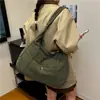 Bolsa com sensação preguiçosa e relaxada para mulheres 2026 nova tendência bolsa tote de grande capacidade bolsa de ombro única para aula trajeto bolsa transversal