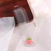 Bonito cepillo para el pelo de fresa de dibujos animados, peine pequeño transparente con purpurina para el hogar, cepillo portátil de alta estética para el cuero cabelludo