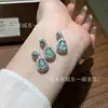 Colgante de calabaza de jadeíta azul natural al por mayor para fabricante con incrustaciones de plata s925, diseño fresco y simple