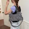 Bolso vintage de ante para mujer, nuevo bolso de mano coreano de moda 2026, estilo motero con tachuelas, bolso tote de alta gama de gran capacidad