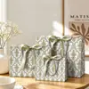 Estoque na fábrica Explosivo Luxo Leve Fita Verde Acompanhando Presente Bolsa de Mão Caixa de Doces Armazenamento Bolsa Portátil para Embalagem de Presente