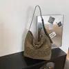 Bolso tejido de moda hueco simple versátil de gran capacidad, bolso de hombro cruzado informal versátil, tejido de paja
