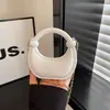 Bolsas Populares deste Ano para Mulheres 2025 Novas Bolsas de Mão Retrô Texturizadas Tendência Outono Bolsa de Ombro Único Transversal de Alta Qualidade