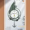 Reloj de Pared Polaris para Sala de Estar Hogar Vela Reloj de Pared Distintivo de Lujo Famoso en Internet Lujo Ligero Arte Moda Colgante de Pared Restaurante