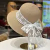 Sombrero de paja con lazo de encaje de perlas estilo francés para mujer, nuevo sombrero de paja para vacaciones de verano en la playa y el mar, protección solar