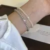 Pulseira de pérolas Swarovski em formato de cubo de açúcar para mulheres, design de nicho de luxo leve, pulseira de pérolas finas requintada e versátil