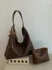 Bolso de hombro nuevo para mujer 2026 transfronterizo, bolso retro para el día a día, bolso grande de capacidad para llevar debajo del brazo, bolso tote para madre e hija
