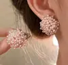 Pendientes de Flor Trenzada de Perlas de Gama Alta Franceses para Mujer 2026 Nuevo Estilo Popular Pendientes de Diseño de Nicho Pendientes Elegantes