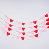 Suministros para Bodas Día de San Valentín Bandera de Amor de Fieltro Banner con Forma de Corazón No Tejido Cortina de Puerta de Corazón Rojo DIY Gratis