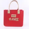 Bolsa de fieltro de la suerte para regalo de agradecimiento, Bolsa de mano para inauguración de casa, Bolso de mano pequeño para el éxito en los exámenes, Bolsa de fieltro para el éxito en los exámenes