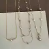 Collar de corazón de perla y circón de lujo ligero estilo francés para mujer, vintage, delicado, moderno, a la moda, versátil para el trabajo, cadena para la clavícula