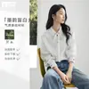 Camisa Listrada com Fita de Lyocell para Mulheres 2026 Primavera Novo Estilo Texturizada Elegante de Manga Longa