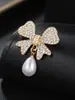 Moda Europea y Americana Nuevo Broche de Pin con Lazo para Ramillete Pin de Cuello Anti-Luz Accesorios para Ropa de Mujer Broche