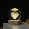 Bola de cristal personalizable grabada con láser 3D con luz nocturna emisora de luz, adorno de cristal de escritorio y decoración que realza el ambiente